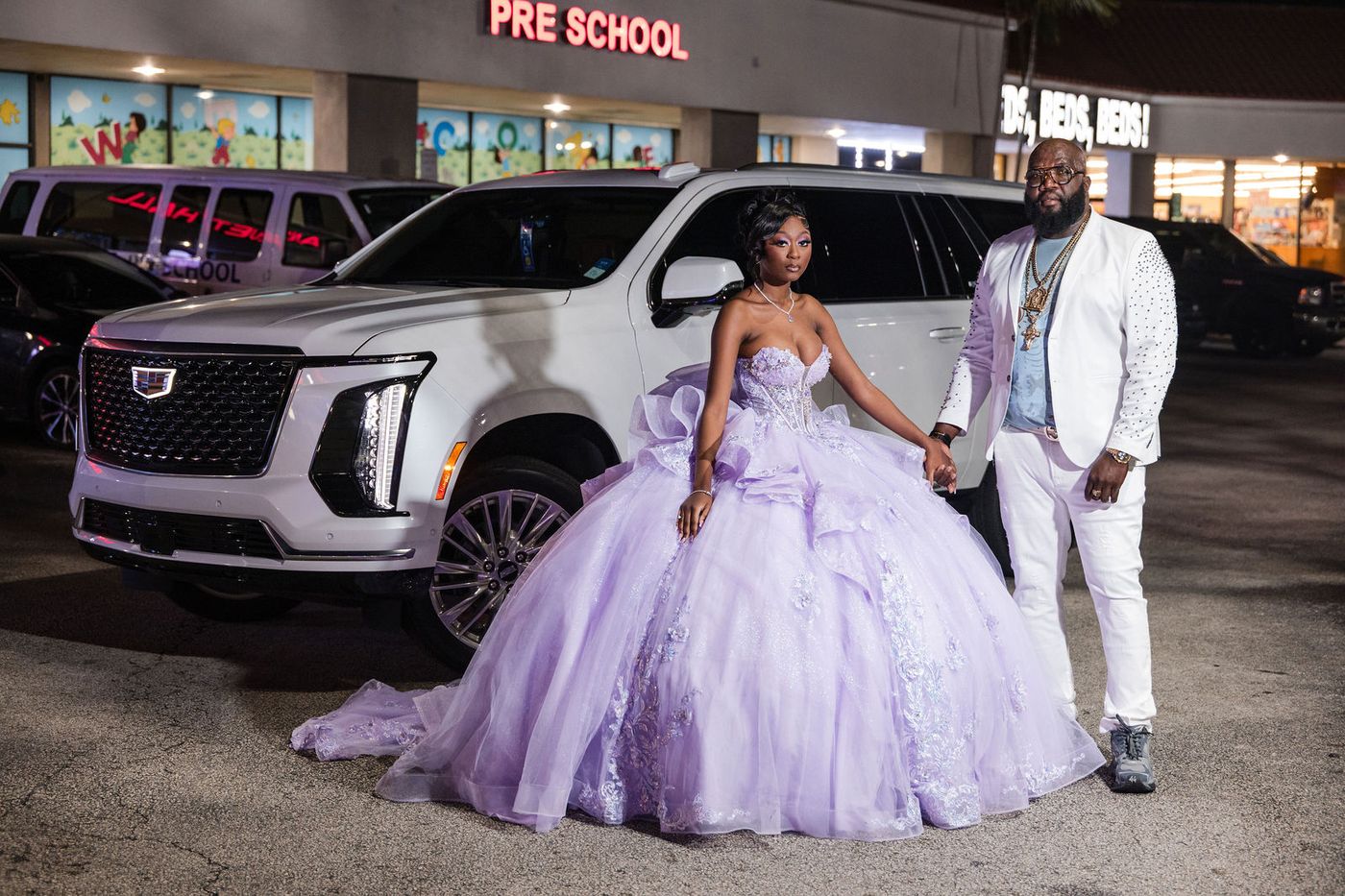 The guest of honour arriving at her sweet sixteen in a lilac ball gown