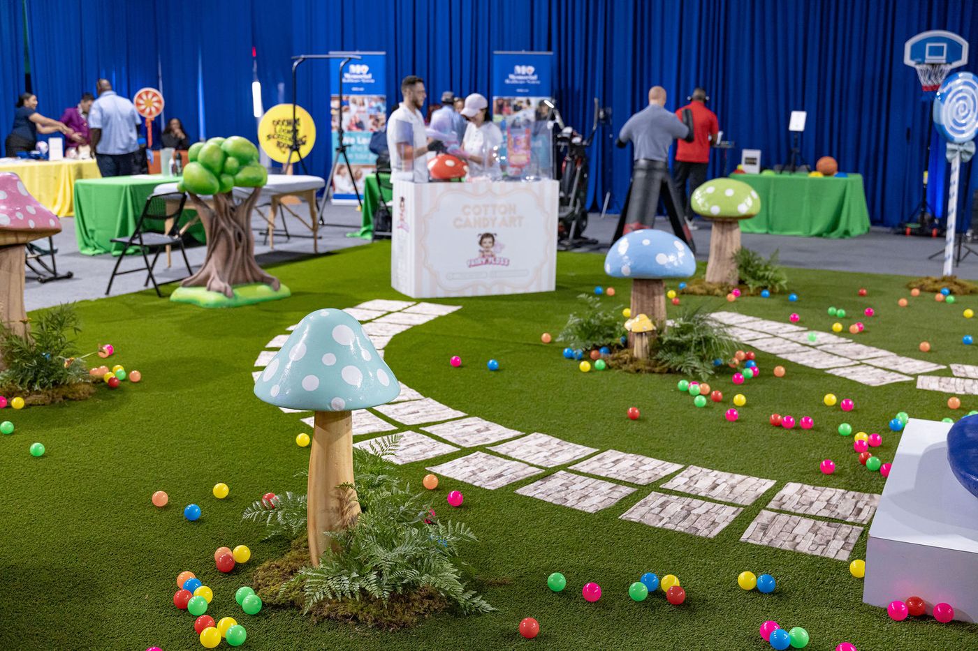 A winding path of stepping stones through an immersive candy themed build