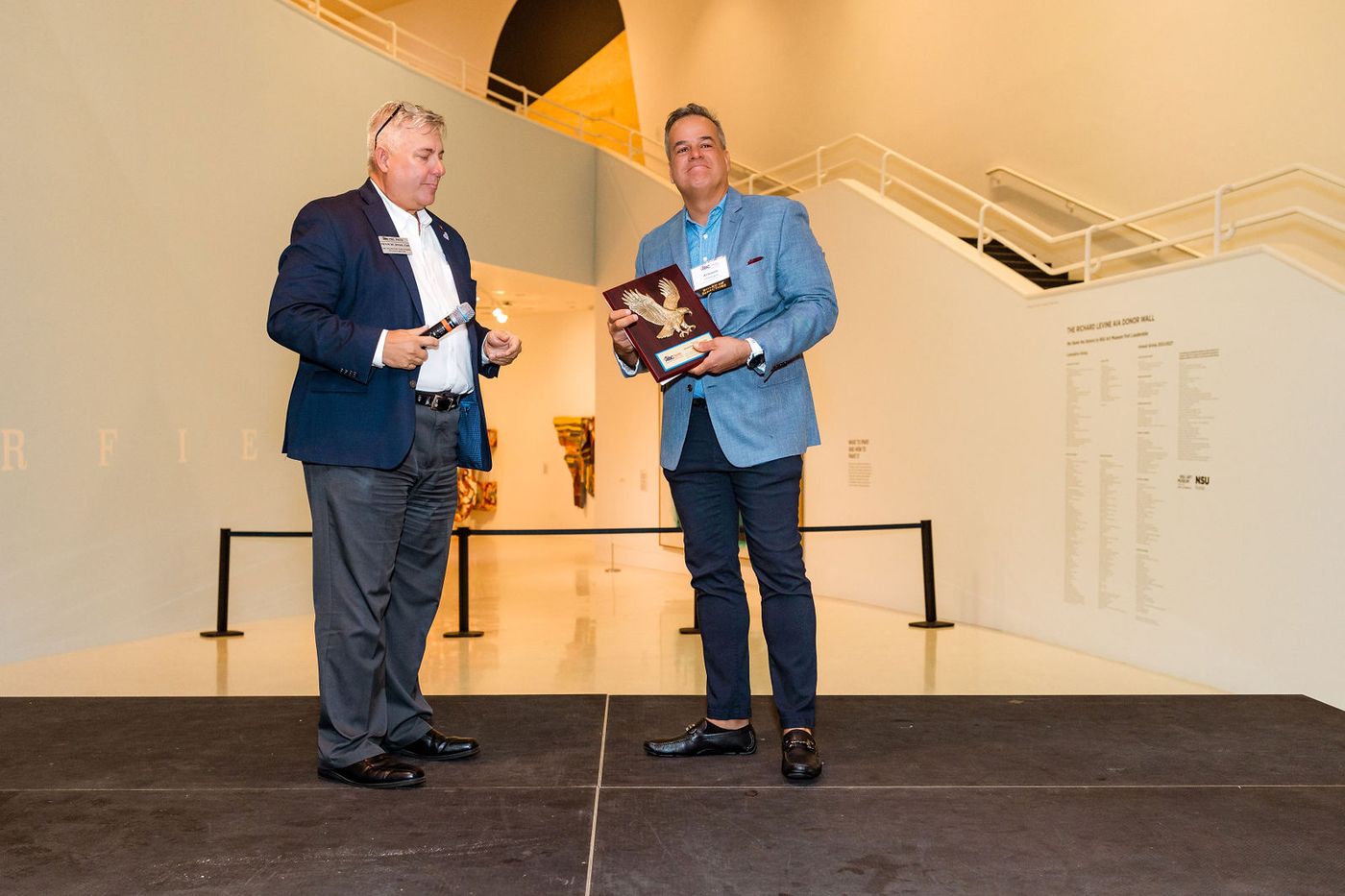 An award handed over on stage at an end-of-year industry celebration