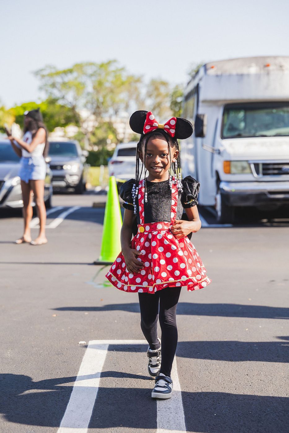 A child in costume arriving at a community kids' prom night