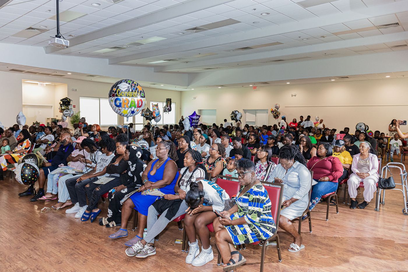 A full hall of families at a school graduation ceremony in South Florida