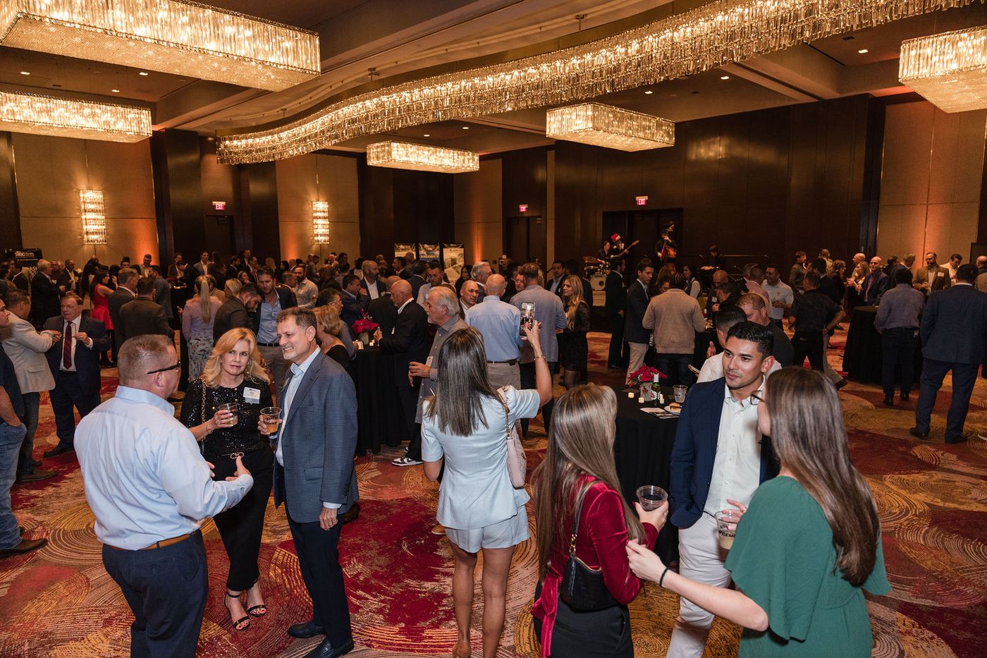 Several hundred guests at an industry chapter holiday party