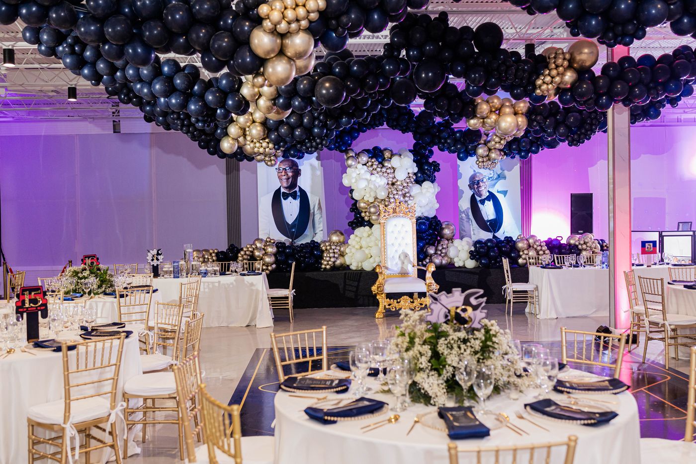The balloon ceiling installation over a milestone birthday ballroom
