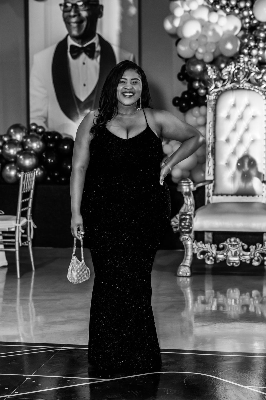 A black and white portrait from the riser at a milestone birthday