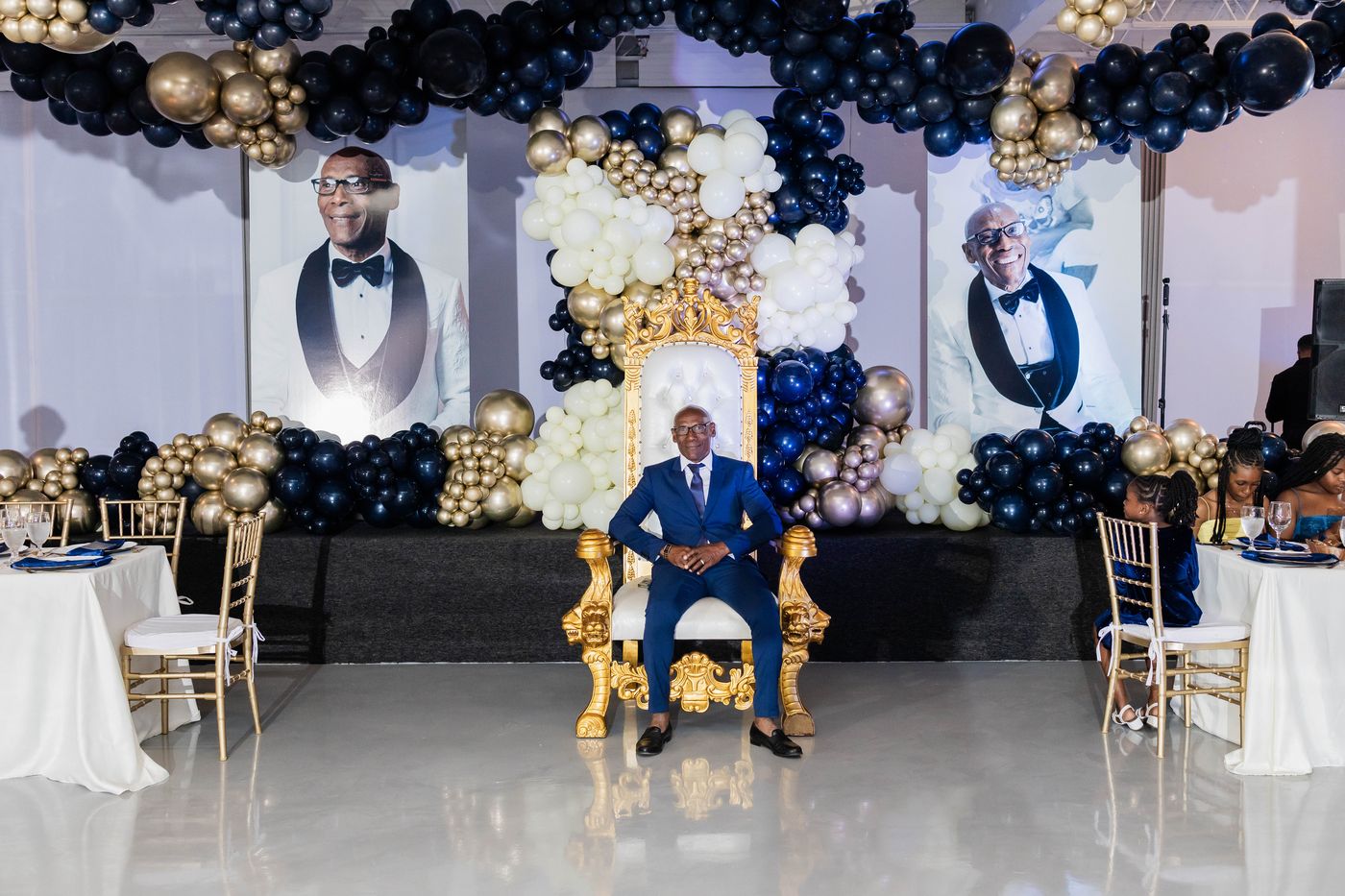 The guest of honour seated on a gilded throne at his 70th