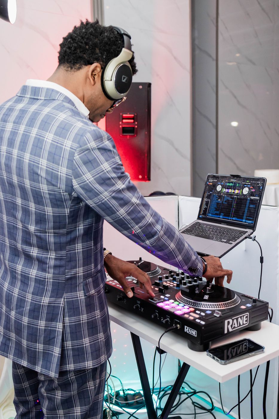 The DJ at a 70th birthday celebration