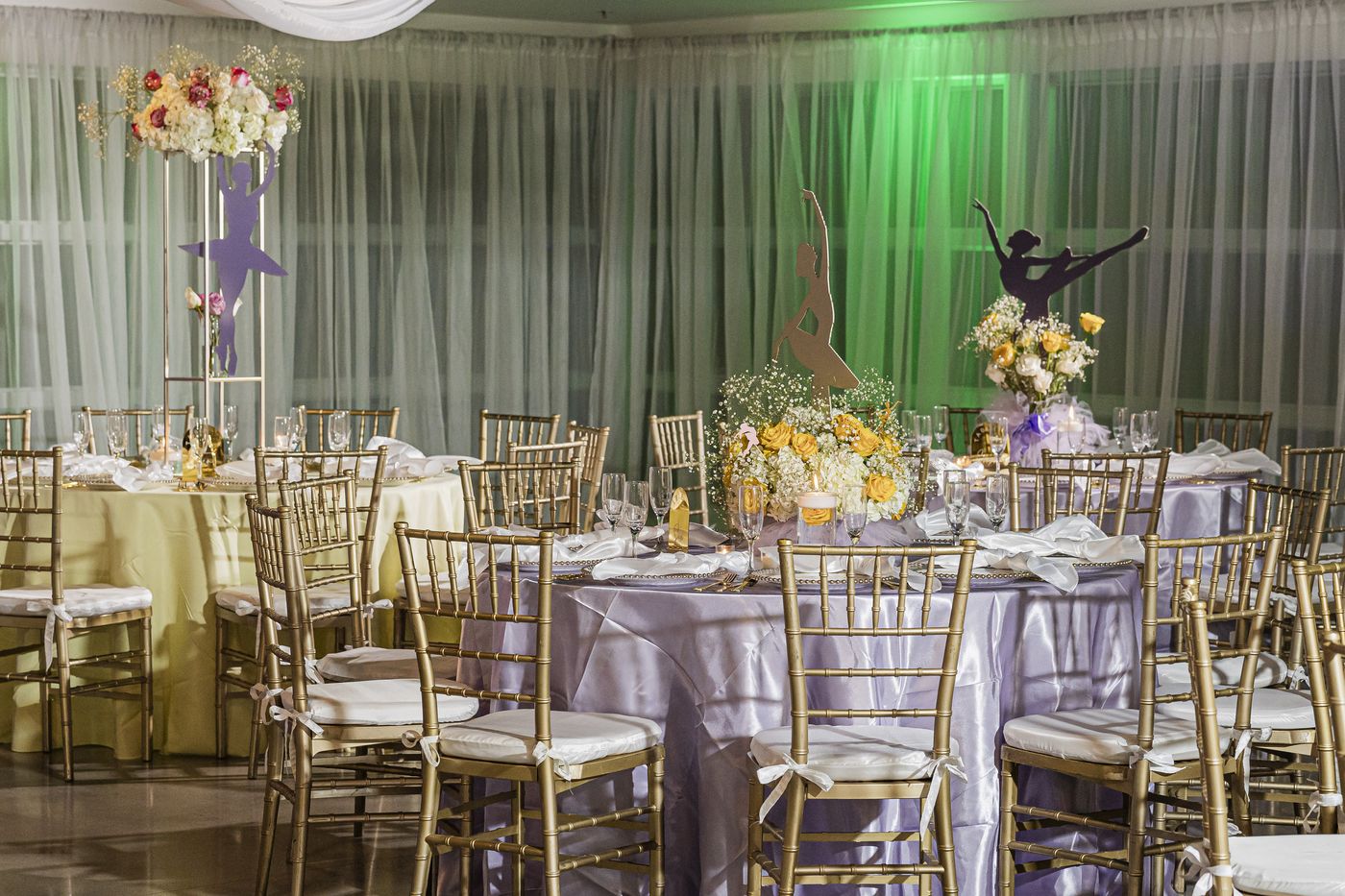 A baby shower room dressed in lilac and gold