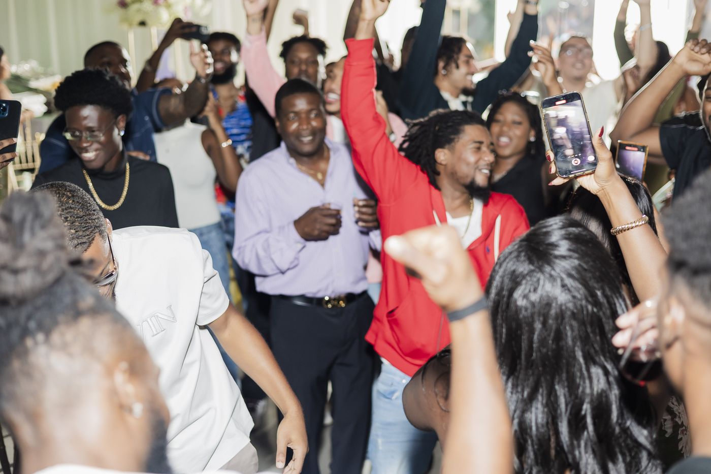 Guests dancing at a baby shower