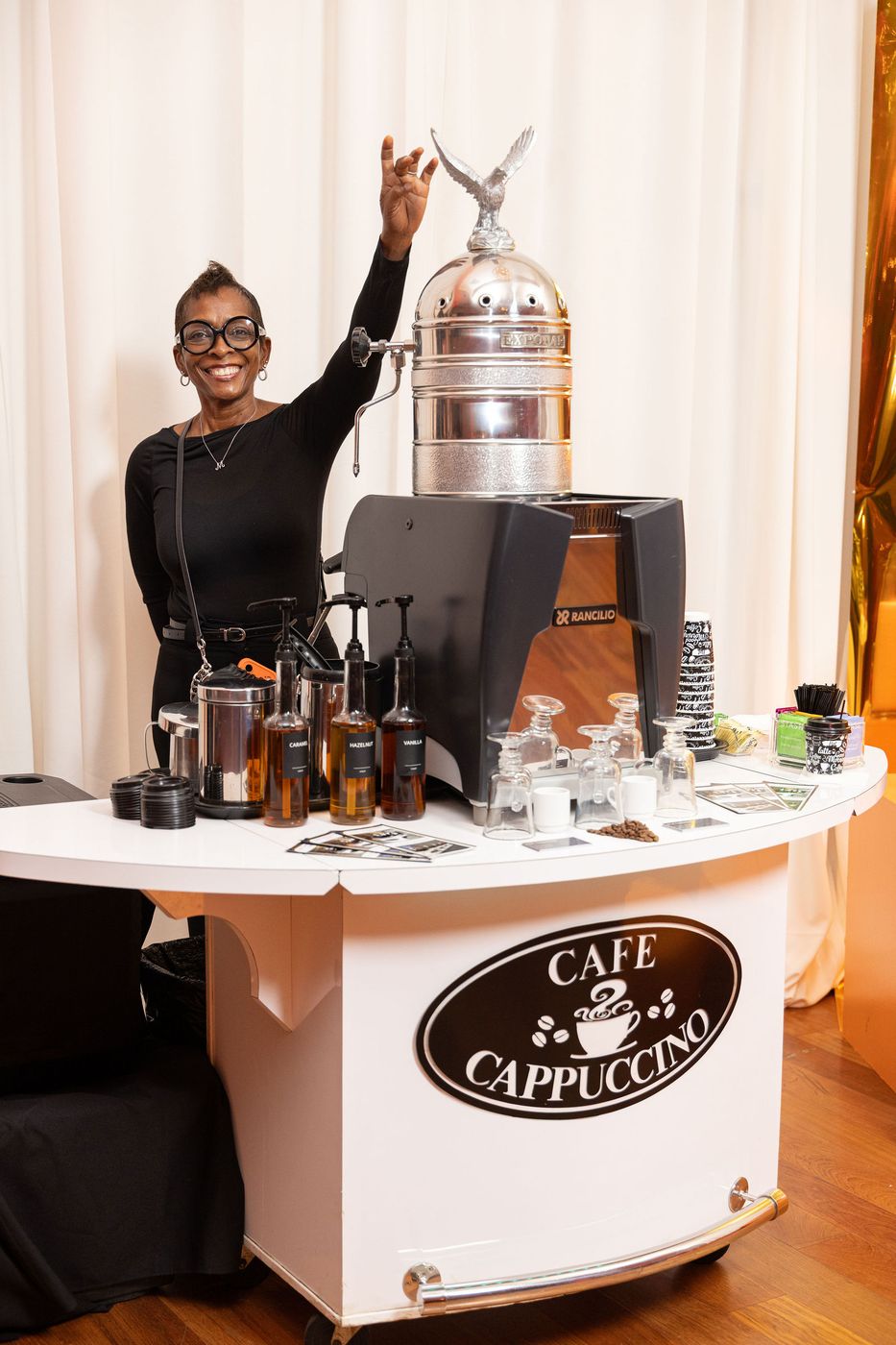 A cappuccino cart serving guests late in the evening at a gala