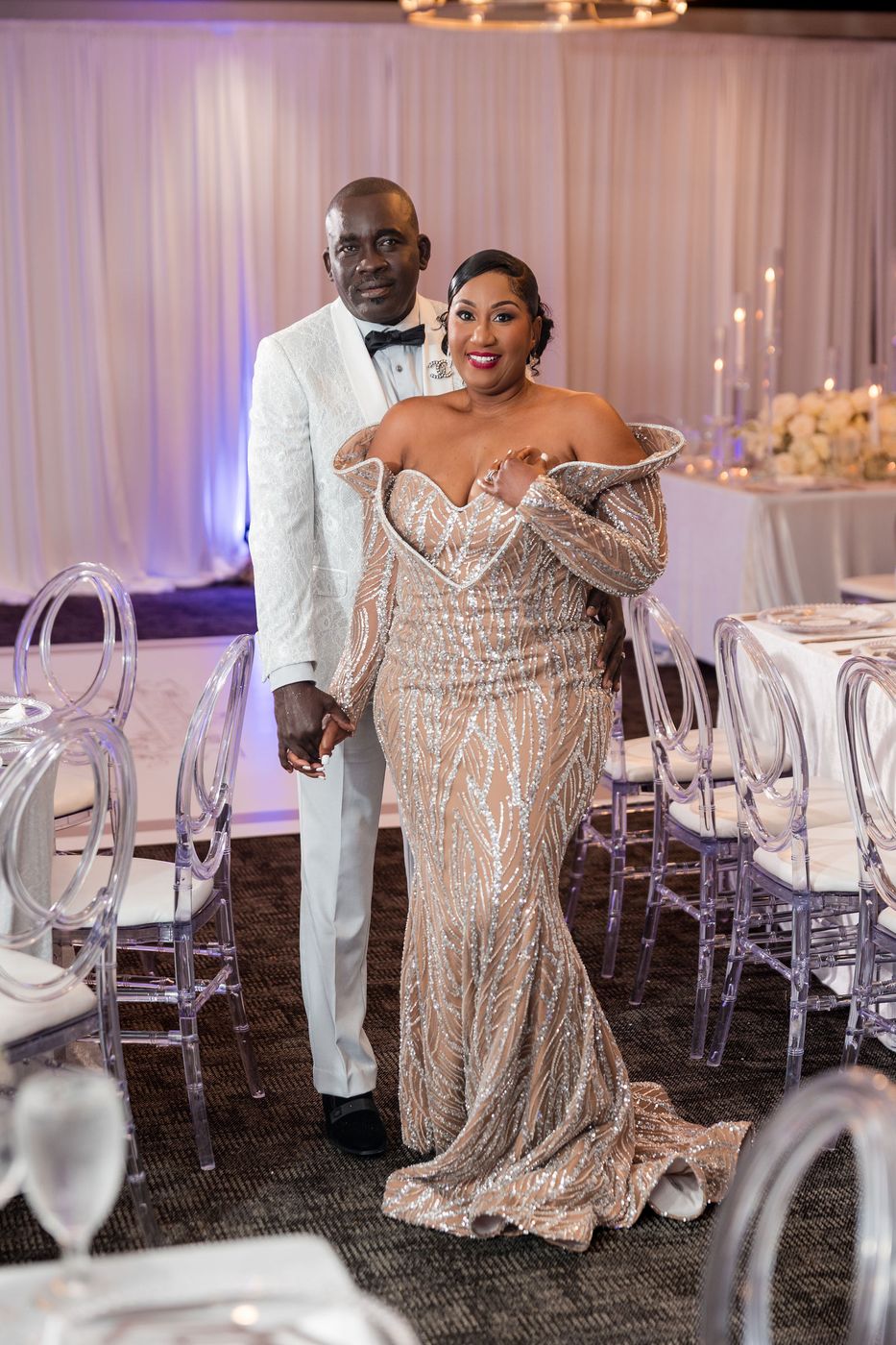 The guest of honour in a sequinned gown at her anniversary celebration