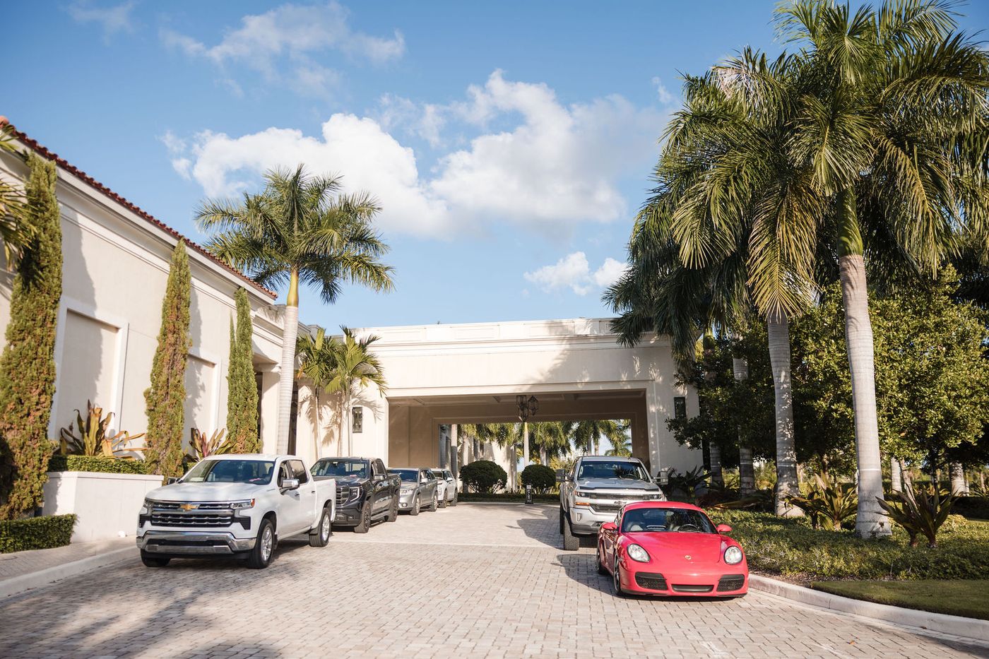 The arrival drive of a South Florida resort hotel on the afternoon of a gala
