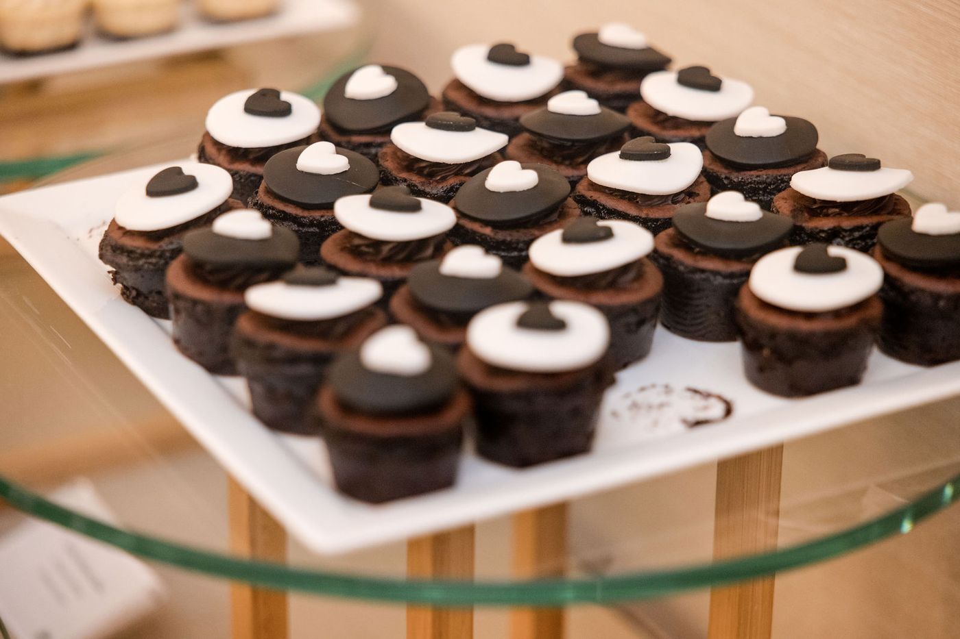 Miniature cakes laid out for the dessert reception at a South Florida banquet